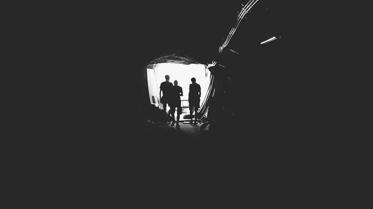 A gamer wearing a high-tech neural interface and haptic suit